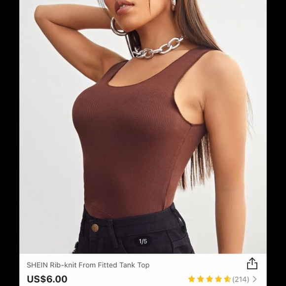 Matching brown tank with leather tie up pants